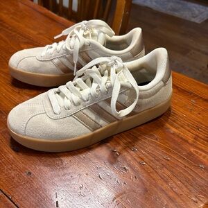 Adidas women’s Cream and Gold Sneakers